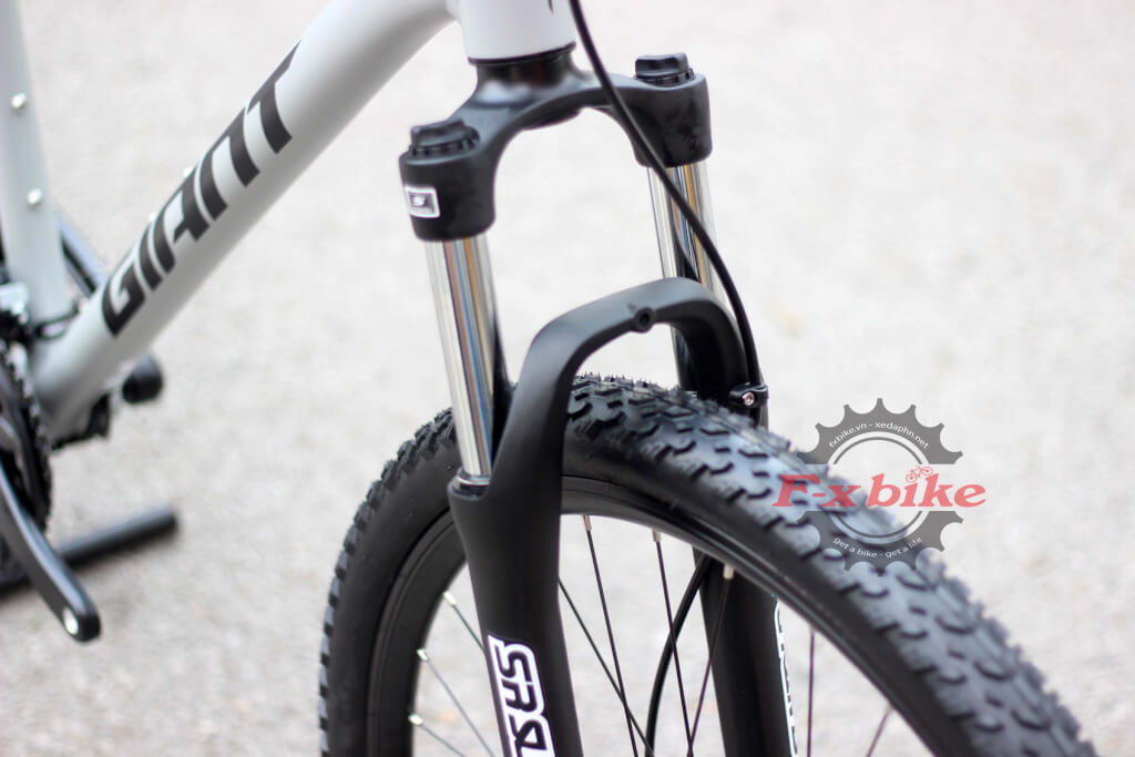 Phuộc SR Suntour XCE 27.5″ nhún dầu có khóa hành trình
