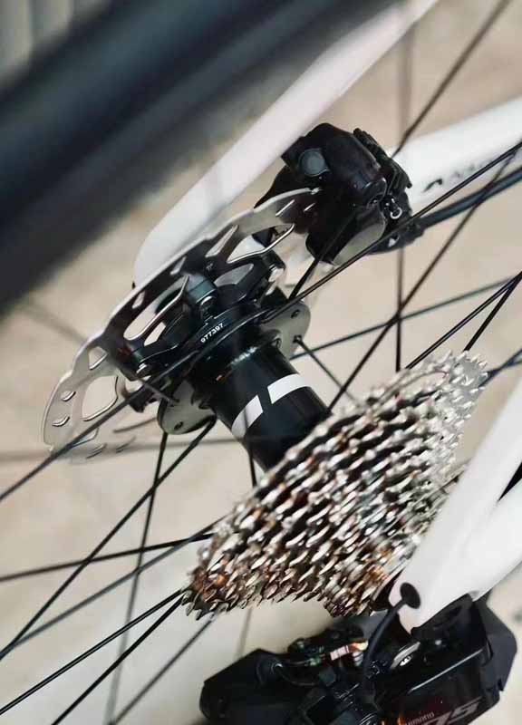 Hub Giant Low Friction Hub, CenterLock, 12mm thru-axle / Líp SHIMANO 105 11s, 11x34T